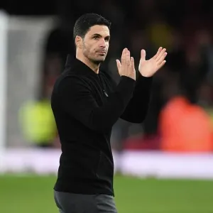 Arsenal's Mikel Arteta Celebrates with Fans after Winning Against Chelsea in Premier League Arsenal's Mikel Arteta Celebrates with Fans after Winning Against Chelsea in Premier League