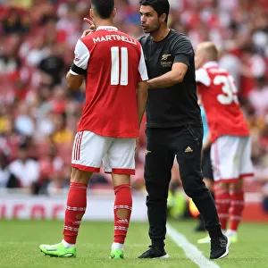 Arsenal's Mikel Arteta Coaches Gabriel Martinelli During Arsenal v Sevilla Emirates Cup Match