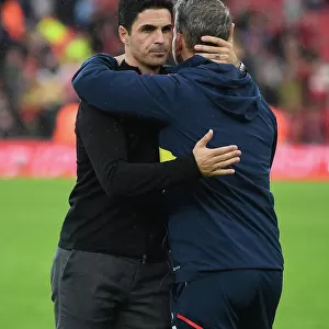 Arsenal's Mikel Arteta Embraces Coach Amidst Premier League Tension: Arsenal FC vs. Nottingham Forest (2022-23)