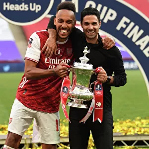 Arsenal's Mikel Arteta and Pierre-Emerick Aubameyang Lift FA Cup after Empty-Stadium Victory over Chelsea
