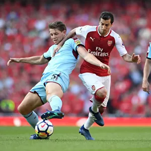 Arsenal's Mkhitaryan Clashes with Burnley's Tarkowski in Intense Premier League Showdown