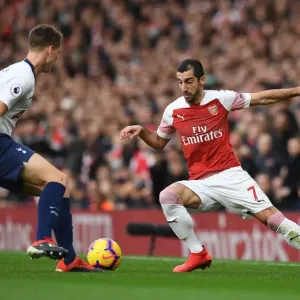 Arsenal's Mkhitaryan Clashes with Tottenham's Foyth in Intense Premier League Showdown