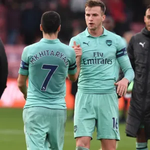 Arsenal's Mkhitaryan and Holding Celebrate Victory Over Bournemouth Arsenal's Mkhitaryan and Holding Celebrate Victory Over Bournemouth