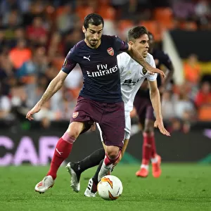 Arsenal's Mkhitaryan Outmaneuvers Valencia's Gabriel in Europa League Semi-Final Showdown