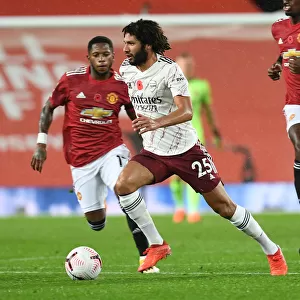 Arsenal's Mo Elneny at Manchester United: Premier League Clash Amidst Empty Stands (2020-21)