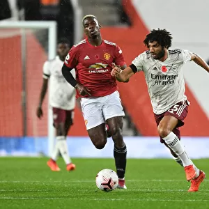 Arsenal's Mo Elneny Outmaneuvers Manchester United's Pogba in Empty Old Trafford
