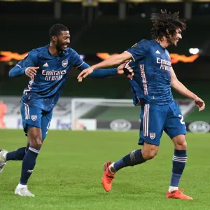 Arsenal's Mohamed Elneny and Ainsley Maitland-Niles Celebrate Goals against Dundalk in Europa League Arsenal's Mohamed Elneny and Ainsley Maitland-Niles Celebrate Goals against Dundalk in Europa League