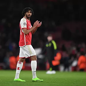 Arsenal's Mohamed Elneny Celebrates with Fans after Securing Group B Win vs Sevilla FC, UEFA Champions League 2023/24