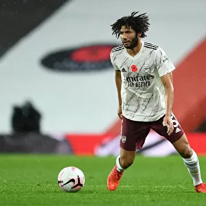 Arsenal's Mohamed Elneny at Manchester United's Old Trafford: 2020-21 Premier League Match Amidst Coronavirus Restrictions