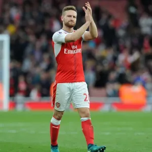 Arsenal's Mustafi Celebrates with Fans: Arsenal's Victory over Swansea City (2016-17)