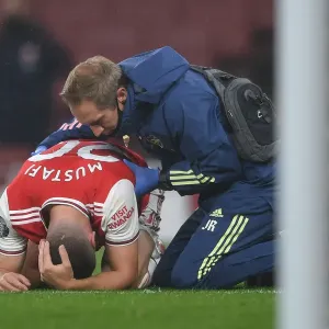 Arsenal's Mustafi Receives Treatment During Arsenal v Leicester City Premier League Match