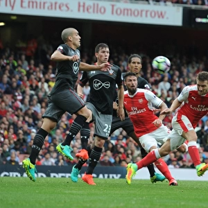 Arsenal's Mustafi Stands Firm Against Southampton's Romeu and Fonte