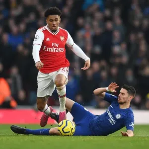 Arsenal's Nelson Clashes with Chelsea's Jorginho: A Premier League Showdown at Emirates Stadium (December 2019)