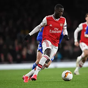Arsenal's Nicolas Pepe in Action: Thrilling Moments from the Arsenal vs. Olympiacos Europa League Clash, 2020