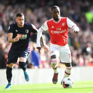 Arsenal's Nicolas Pepe Clashes with Bournemouth's Diego Rico in Premier League Showdown Arsenal's Nicolas Pepe Clashes with Bournemouth's Diego Rico in Premier League Showdown