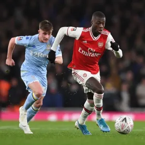Arsenal's Nicolas Pepe Clashes with Leeds Robbie Gotts in FA Cup Third Round Arsenal's Nicolas Pepe Clashes with Leeds Robbie Gotts in FA Cup Third Round