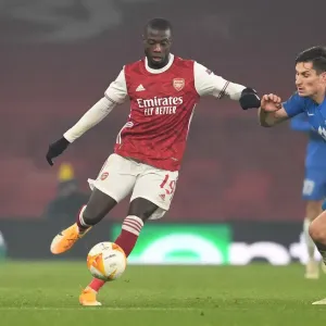 Arsenal's Nicolas Pepe Clashes with Molde's Kristoffer Haugen in Europa League Battle