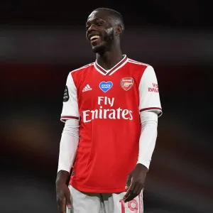 Arsenal's Nicolas Pepe in Empty Emirates Stadium: Arsenal FC vs Liverpool FC, Premier League 2019-2020 Arsenal's Nicolas Pepe in Empty Emirates Stadium: Arsenal FC vs Liverpool FC, Premier League 2019-2020