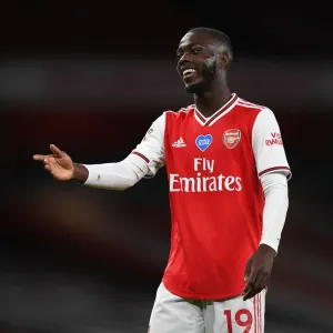Arsenal's Nicolas Pepe Faces Liverpool in Empty Emirates Stadium (Arsenal v Liverpool 2019-20) Arsenal's Nicolas Pepe Faces Liverpool in Empty Emirates Stadium (Arsenal v Liverpool 2019-20)