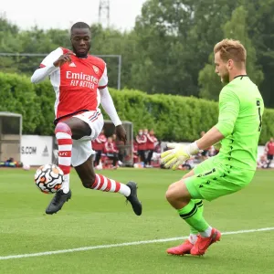 Arsenal's Nicolas Pepe Faces Off Against Millwall's George Long in Pre-Season Friendly Arsenal's Nicolas Pepe Faces Off Against Millwall's George Long in Pre-Season Friendly