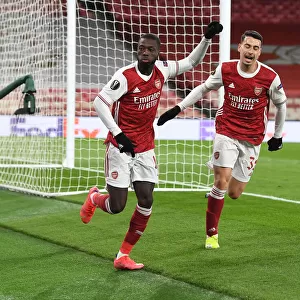Arsenal's Nicolas Pepe and Gabriel Martinelli Celebrate Goal in Empty Emirates Stadium During Europa League Quarterfinal vs Slavia Praha