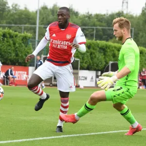 Arsenal's Nicolas Pepe Goes Head-to-Head with Millwall's George Long in Pre-Season Clash Arsenal's Nicolas Pepe Goes Head-to-Head with Millwall's George Long in Pre-Season Clash
