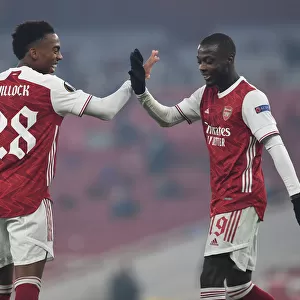 Arsenal's Nicolas Pepe and Joe Willock Celebrate Goals Against Molde in Europa League