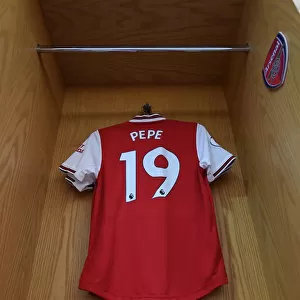 Arsenal's Nicolas Pepe Prepares for Aston Villa Clash in Emirates Stadium Changing Room