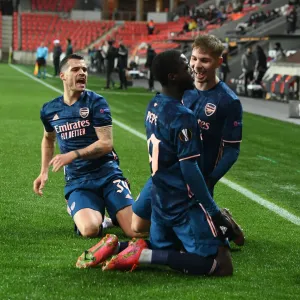 Arsenal's Nicolas Pepe Scores in Empty Eden Arena: Securing Europa League Quarterfinal Victory over Slavia Prague Arsenal's Nicolas Pepe Scores in Empty Eden Arena: Securing Europa League Quarterfinal Victory over Slavia Prague