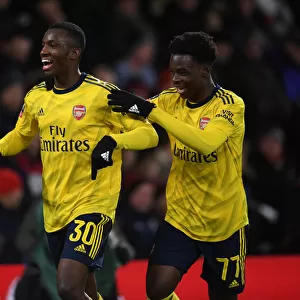 Arsenal's Nketiah and Saka Celebrate FA Cup Goals Against AFC Bournemouth