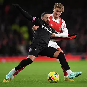 Arsenal's Odegaard Chases Down Benrahma: A Battle of Determination in Arsenal vs. West Ham Match
