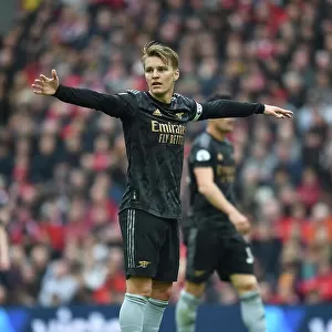 Arsenal's Odegaard Clashes with Liverpool in Premier League Battle (2022-23)