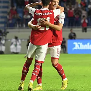 Arsenal's Odegaard and Vieira Celebrate Goal Against AC Milan at Dubai Super Cup
