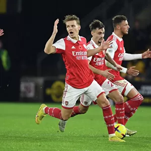 Arsenal's Odegaard, Vieira, and White in Action: Premier League 2022-23 - Wolverhampton Wanderers vs. Arsenal