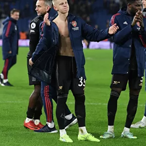 Arsenal's Oleksandr Zinchenko Celebrates with Fans after Brighton Victory