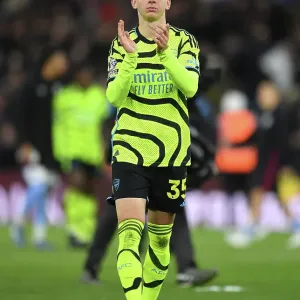 Arsenal's Oleksandr Zinchenko Celebrates with Fans after Aston Villa Victory (2023-24) Arsenal's Oleksandr Zinchenko Celebrates with Fans after Aston Villa Victory (2023-24)