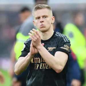 Arsenal's Oleksandr Zinchenko Celebrates with Fans after Intense Liverpool Victory (2022-23) Arsenal's Oleksandr Zinchenko Celebrates with Fans after Intense Liverpool Victory (2022-23)