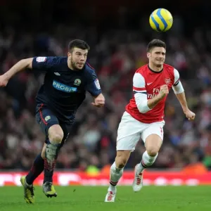 Arsenal's Olivier Giroud Chases Down Blackburn's Grant Hanley in FA Cup Clash