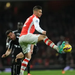 Arsenal's Olivier Giroud Faces Off Against Newcastle's Paul Dummett in Intense Premier League Clash Arsenal's Olivier Giroud Faces Off Against Newcastle's Paul Dummett in Intense Premier League Clash