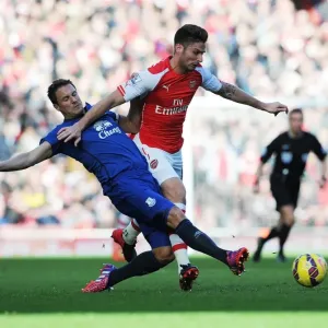 Arsenal's Olivier Giroud Outmaneuvers Everton's Phil Jagielka During the Intense Arsenal vs. Everton Premier League Clash, 2015 Arsenal's Olivier Giroud Outmaneuvers Everton's Phil Jagielka During the Intense Arsenal vs. Everton Premier League Clash, 2015