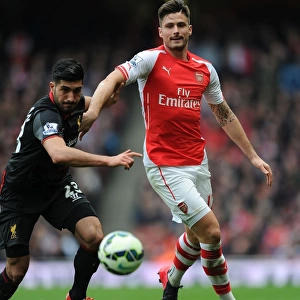 Arsenal's Olivier Giroud Outsmarts Liverpool's Emre Can in Intense Arsenal v Liverpool Clash (April 2015)