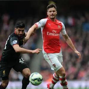 Arsenal's Olivier Giroud Outsmarts Liverpool's Emre Can in Intense Arsenal v Liverpool Clash (April 2015)