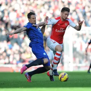 Arsenal's Olivier Giroud Scores Past Everton's Phil Jagielka - Arsenal vs Everton, Premier League 2014-15 Arsenal's Olivier Giroud Scores Past Everton's Phil Jagielka - Arsenal vs Everton, Premier League 2014-15