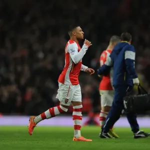 Arsenal's Oxlade-Chamberlain Battles for Possession against Manchester United (Premier League 2014-15) Arsenal's Oxlade-Chamberlain Battles for Possession against Manchester United (Premier League 2014-15)