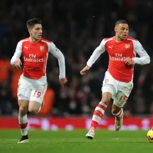 Arsenal's Oxlade-Chamberlain and Bellerin in Action: Arsenal vs Newcastle United (2014/15) Arsenal's Oxlade-Chamberlain and Bellerin in Action: Arsenal vs Newcastle United (2014/15)