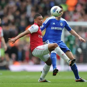 Arsenal's Oxlade-Chamberlain Clashes with Chelsea's Romeu: A Premier League Showdown at Emirates Stadium Arsenal's Oxlade-Chamberlain Clashes with Chelsea's Romeu: A Premier League Showdown at Emirates Stadium
