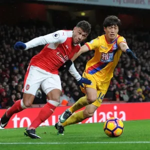 Arsenal's Oxlade-Chamberlain Clashes with Crystal Palace's Chung-Yong Lee Arsenal's Oxlade-Chamberlain Clashes with Crystal Palace's Chung-Yong Lee