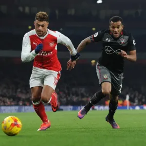 Arsenal's Oxlade-Chamberlain Clashes with Southampton's Bertrand in EFL Cup Quarter-Final Arsenal's Oxlade-Chamberlain Clashes with Southampton's Bertrand in EFL Cup Quarter-Final