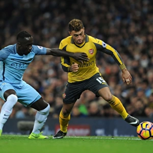 Arsenal's Oxlade-Chamberlain Faces Off Against Man City's Sagna in Premier League Clash (2016-17)