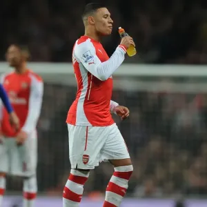 Arsenal's Oxlade-Chamberlain Fights for Possession against Manchester United (Premier League 2014-15) Arsenal's Oxlade-Chamberlain Fights for Possession against Manchester United (Premier League 2014-15)